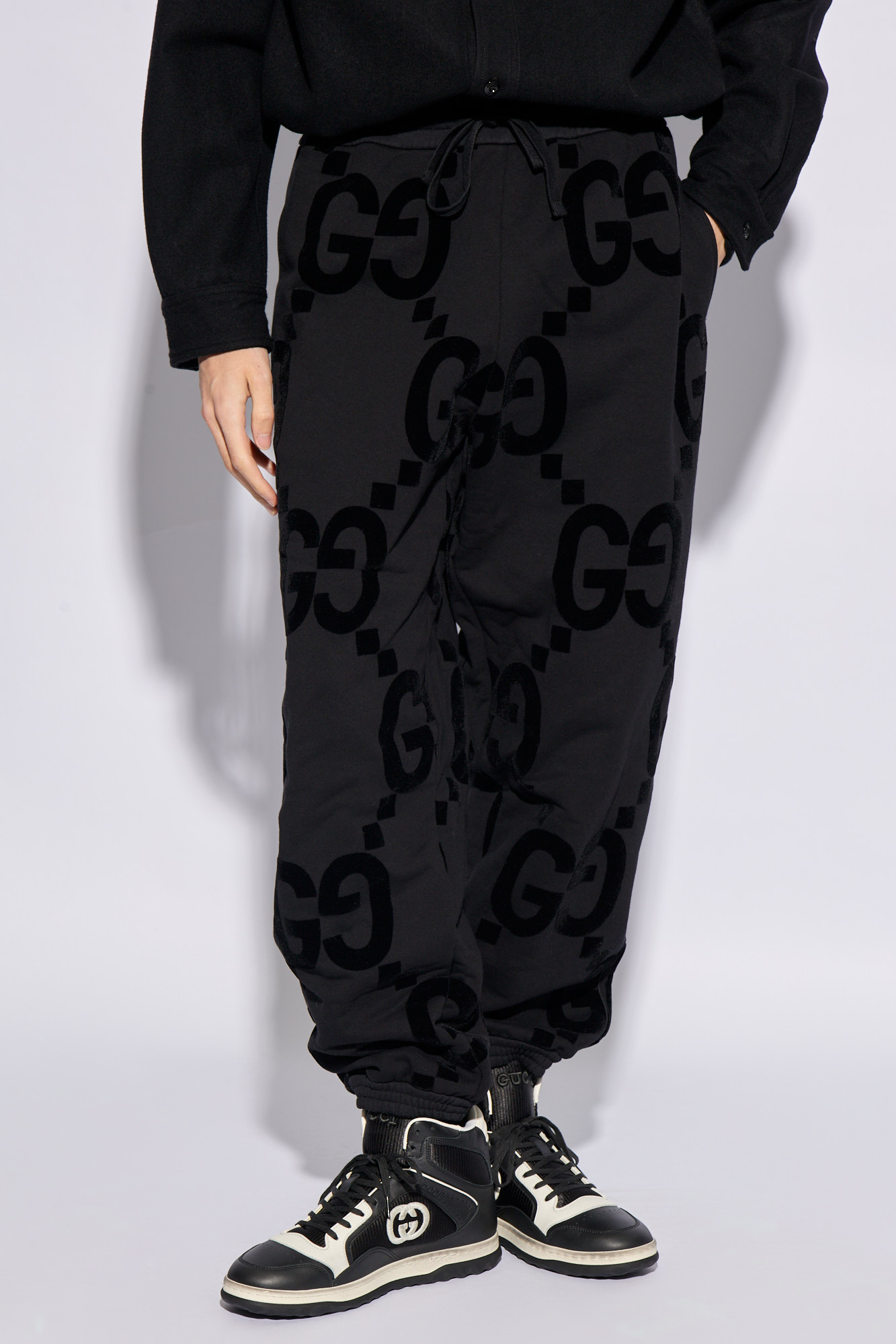 Gucci monogram sweatpants online